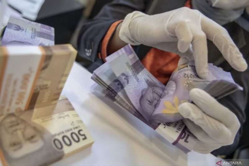 Rupiah Melemah, Tembus Rp16.297 per Dolar AS