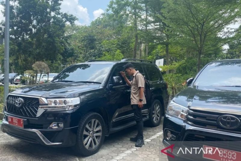 Kejati Riau Kembalikan 156 Ponsel dan 4 Mobil Dinas Kampar: Kasus Korupsi Fiktif?