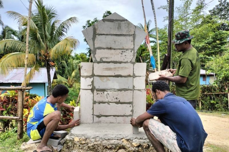 Tugu TMMD di Kampung Kbusdori: Simbol Gotong Royong TNI dan Rakyat Papua