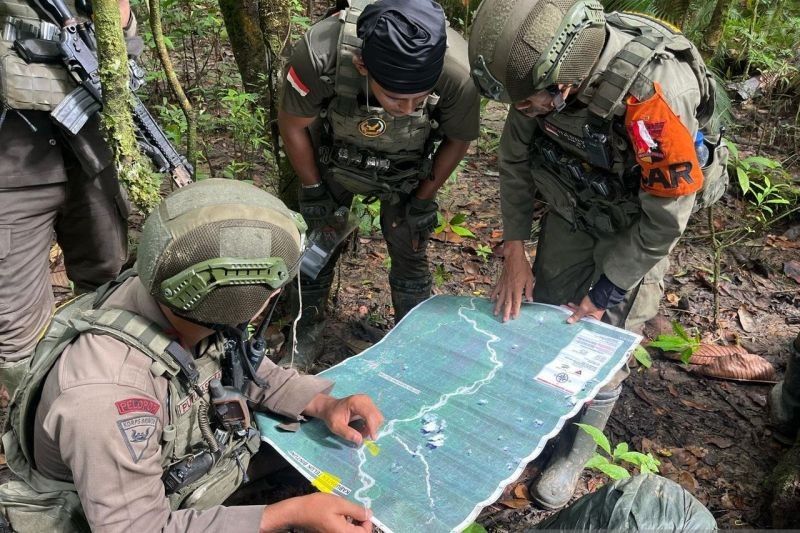 Tim SAR Brimob Sisir Zona Merah di Bintuni, Cari Iptu Tomi Marbun yang Hilang