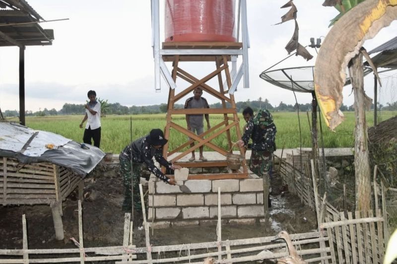 Kodim HST Bangun 5 Sumur Bor, Warga Desa Pengambau Hilir Luar Kalsel Nikmati Air Bersih