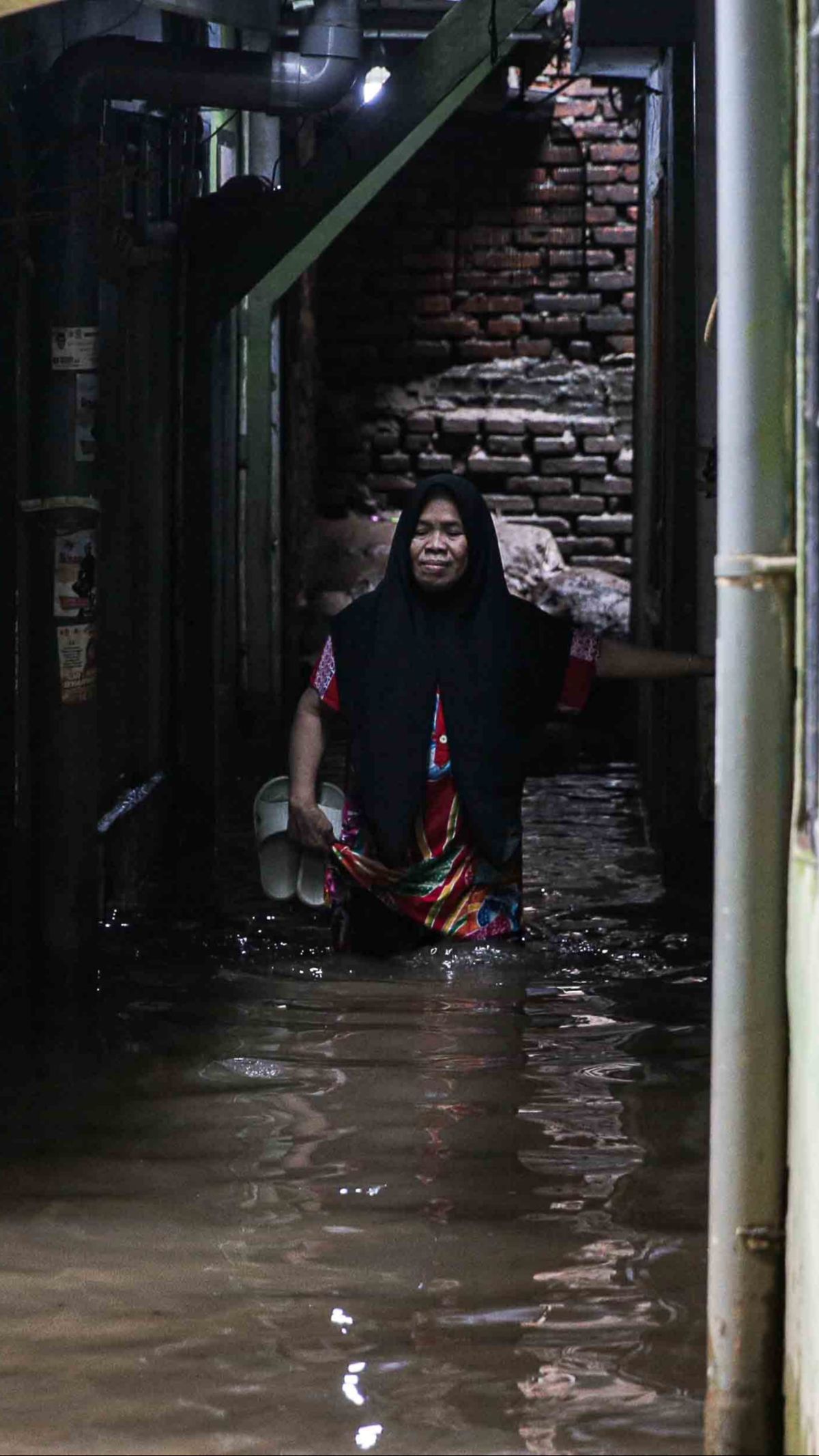 FOTO: Kondisi Banjir Kiriman di Kebon Pala Mulai Surut