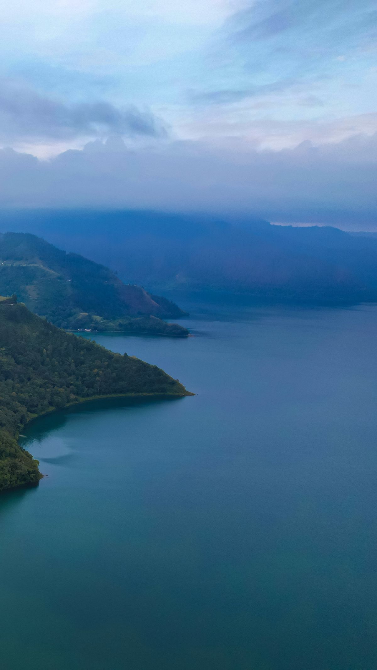 Air Tak Menyatu, Begini Penampakan Unik Perbatasan Sungai dan Danau Toba