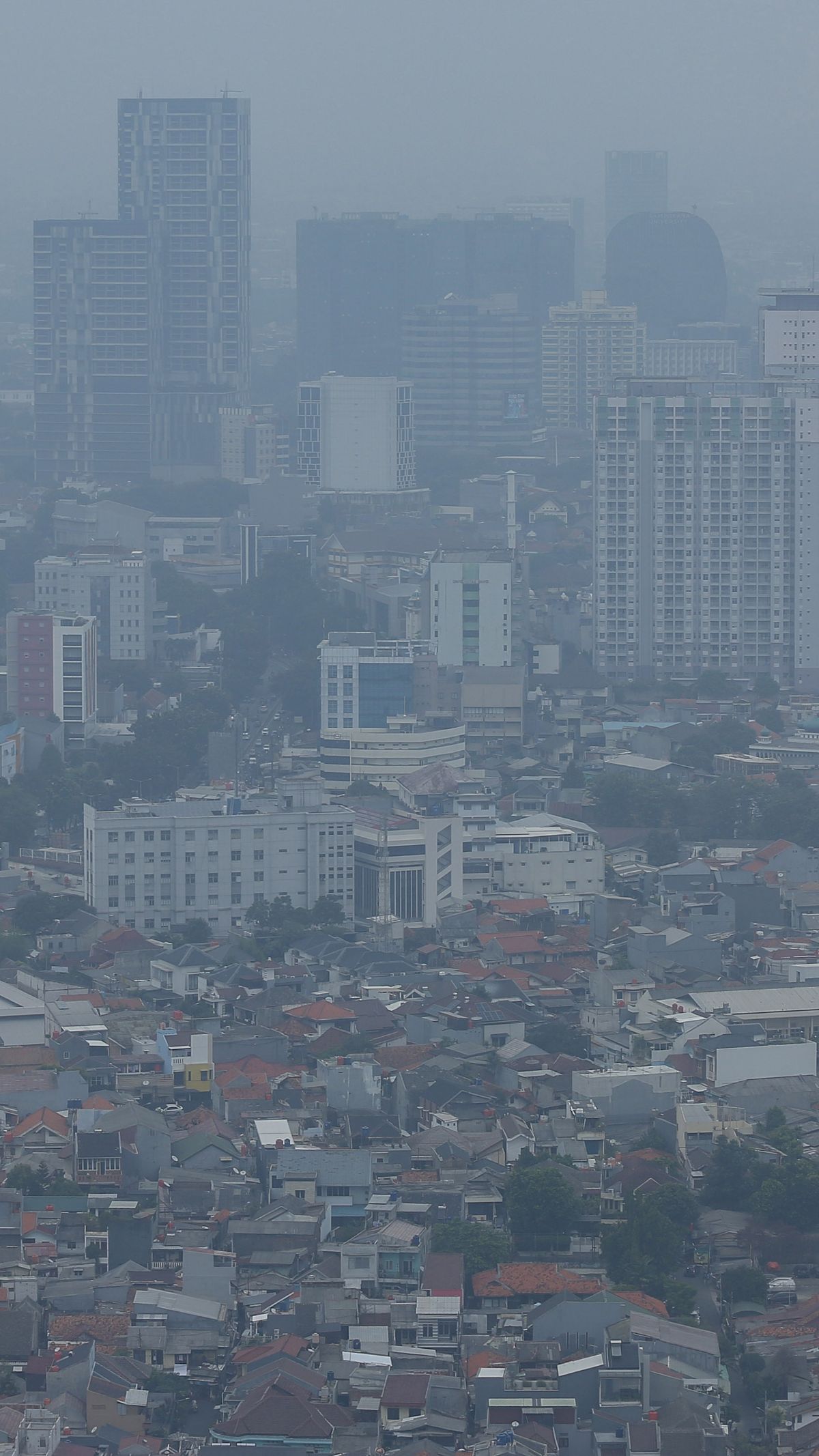 FOTO: Polusi Jakarta Terburuk Dunia, Warga Diimbau Kurangi Penggunaan Kendaraan Pribadi