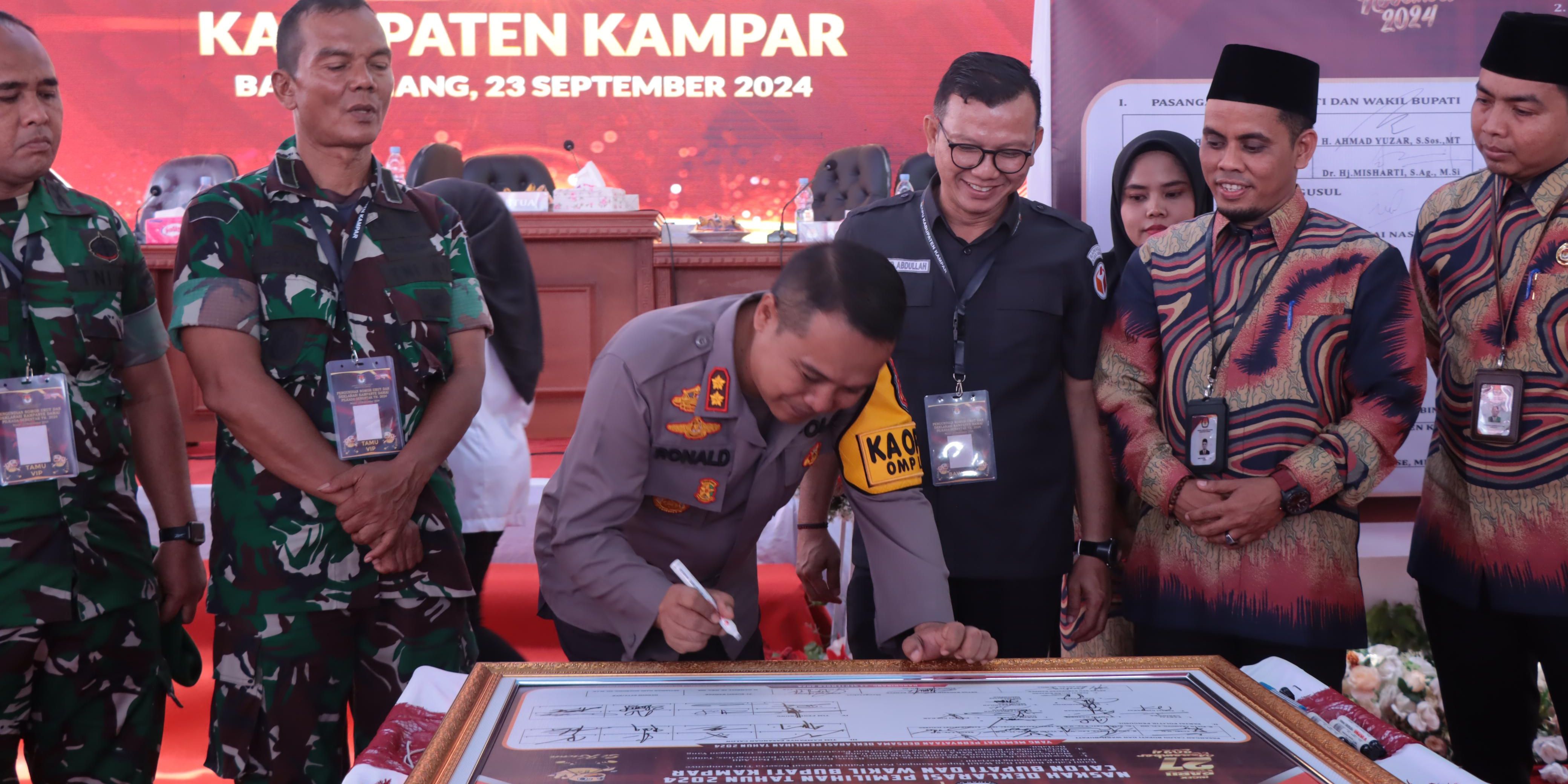 4 Paslon Resmi Berlaga, Ini Pesan Kapolres Kampar Saat Deklarasi Pilkada Damai