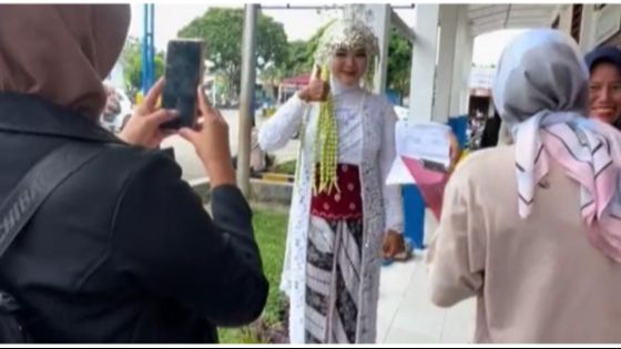 Momen Mahasiswi UT Ujian Pakai Baju Pengantin Ini Viral, Curi Perhatian