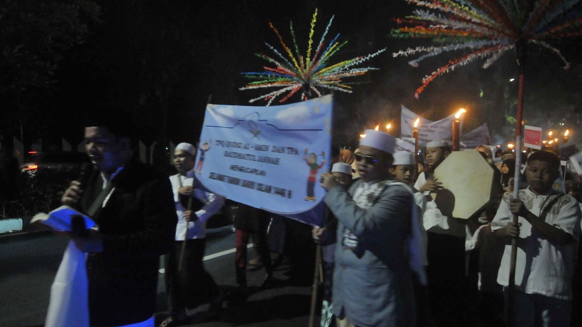 FOTO: Semarak Tradisi Pawai Obor Menyambut Tahun Baru Islam 1 Muharram 1446 H