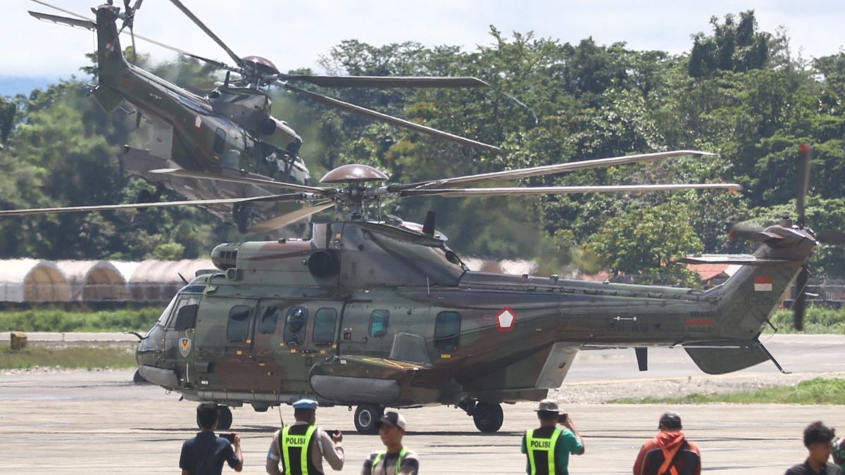 FOTO: Penampakan Helikoper TNI Dikerahkan untuk Evakuasi Jenazah Pilot Selandia Baru yang Dibunuh KKB di Papua