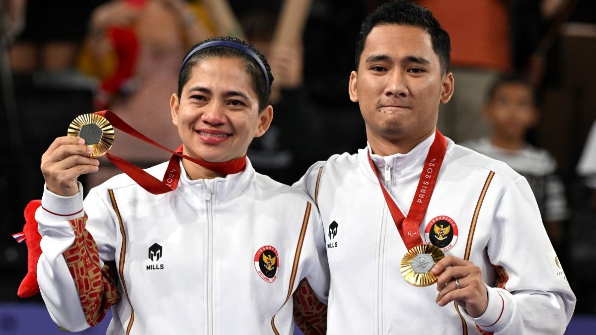 FOTO: Ganda Campuran Hikmat Ramdani dan Leani Ratri Oktila Raih Emas Pertama untuk Indonesia di Paralimpiade Paris 2024