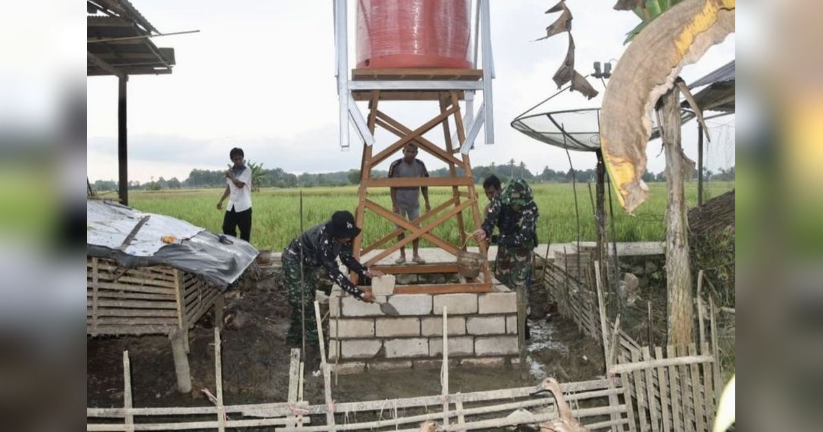 Kodim HST Bangun 5 Sumur Bor, Warga Desa Pengambau Hilir Luar Kalsel Nikmati Air Bersih