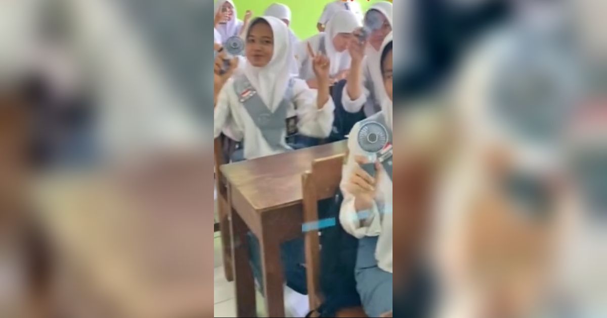 Cuaca Panas Menyengat, Aksi Bendahara Kelas Borong Kipas Angin Portabel untuk Murid Sekelas Ini Viral