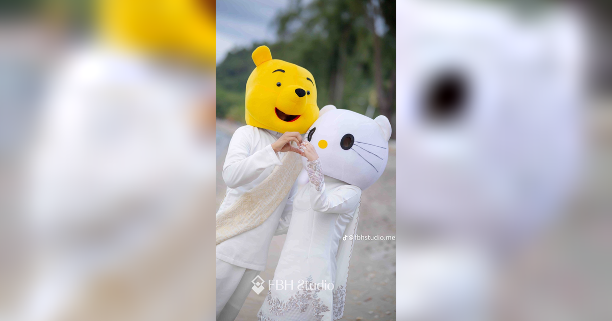 Di Luar Rencana, Pasangan Ini Pakai Kepala Badut untuk Foto Pernikahan, Hasilnya Menggemaskan!