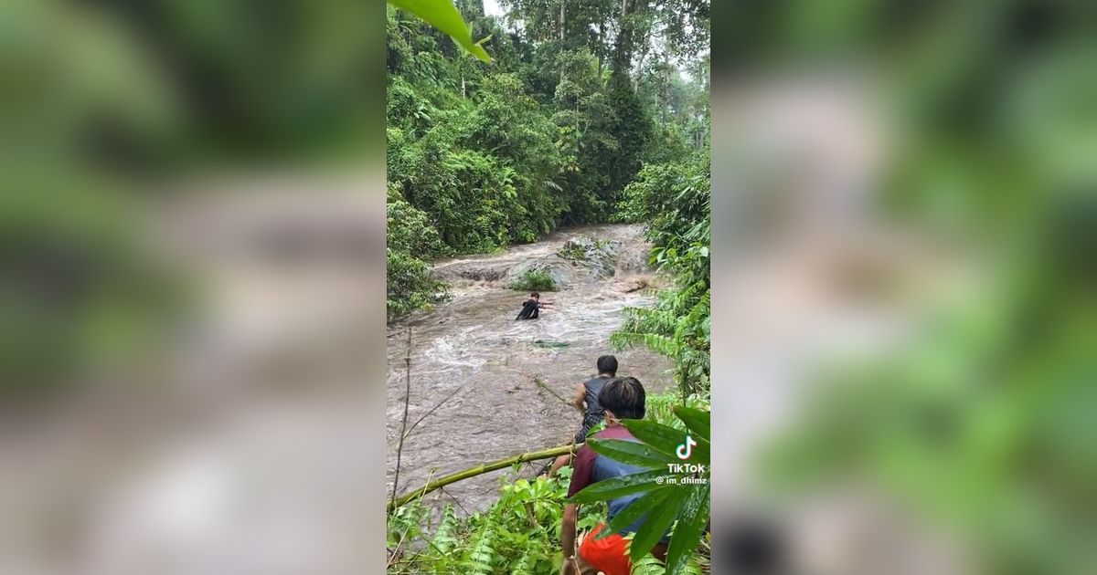 Viral Momen Menegangkan Penyelamatan Pemuda yang Terjebak di Tengah Sungai, Endingnya Bikin Heran Warganet