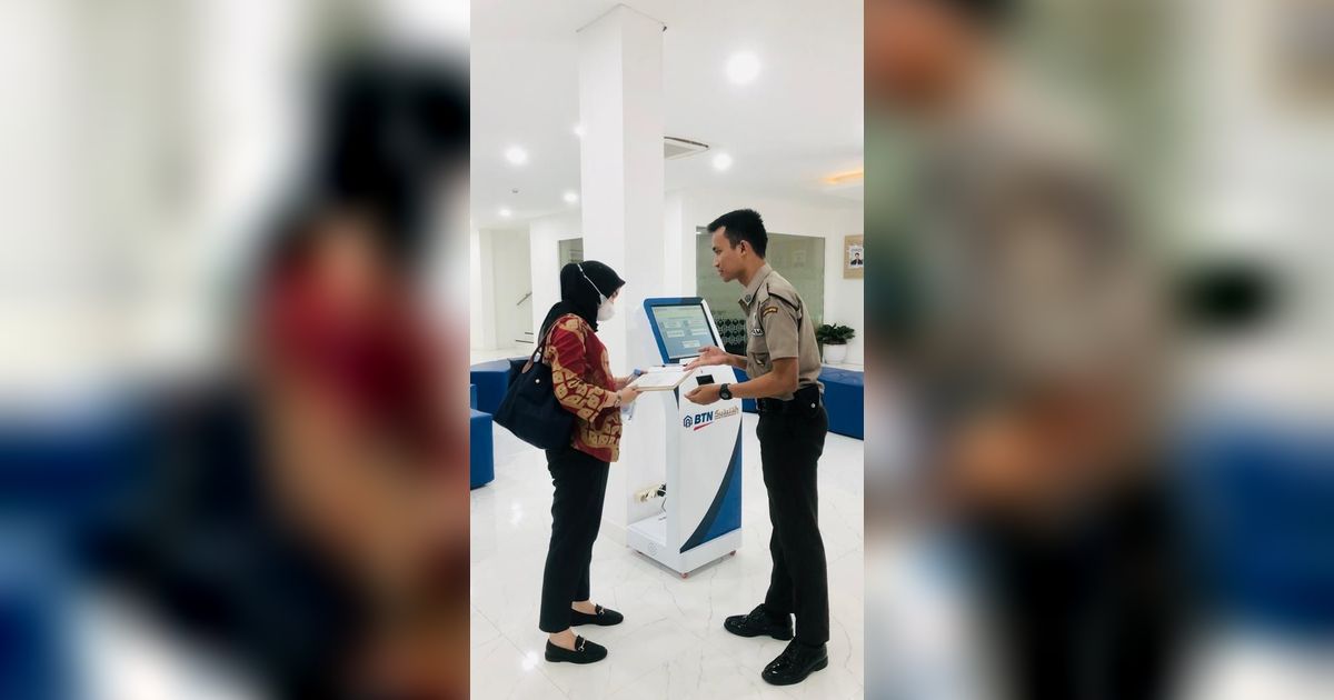 Satpam Perbankan Kini Berlomba Bisa Bantu Nasabah Bertransaksi