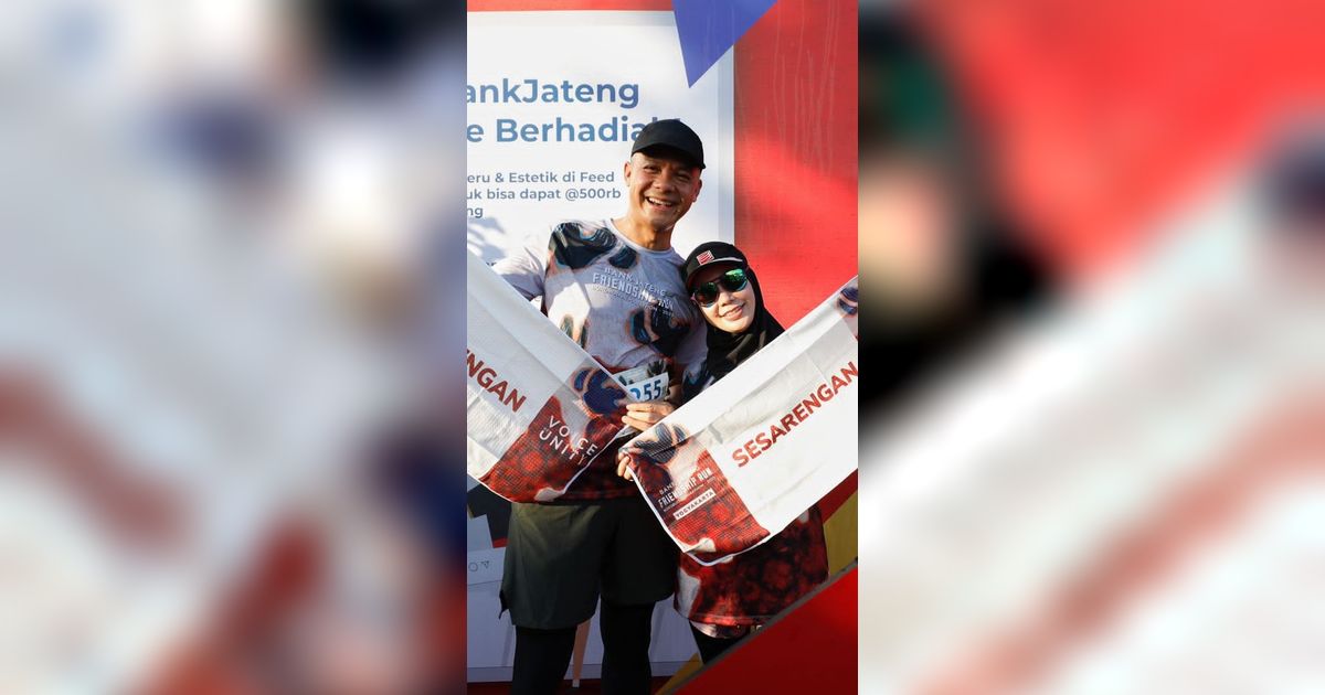 Romantis sampai Finish, Ini Momen Ganjar Dikawal Istri saat Lari Marathon di Yogya