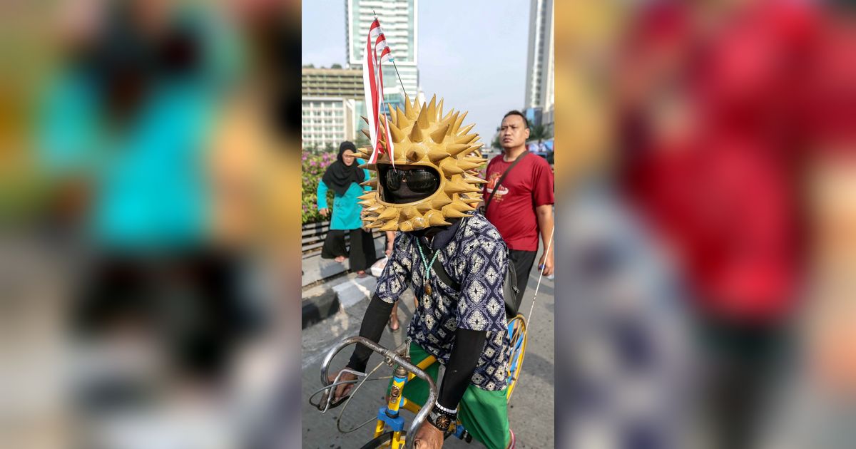 FOTO: Suasana Car Free Day di Kawasan Bundaran HI Jakarta dengan Keadaan Polusi Udara Terburuk di Dunia