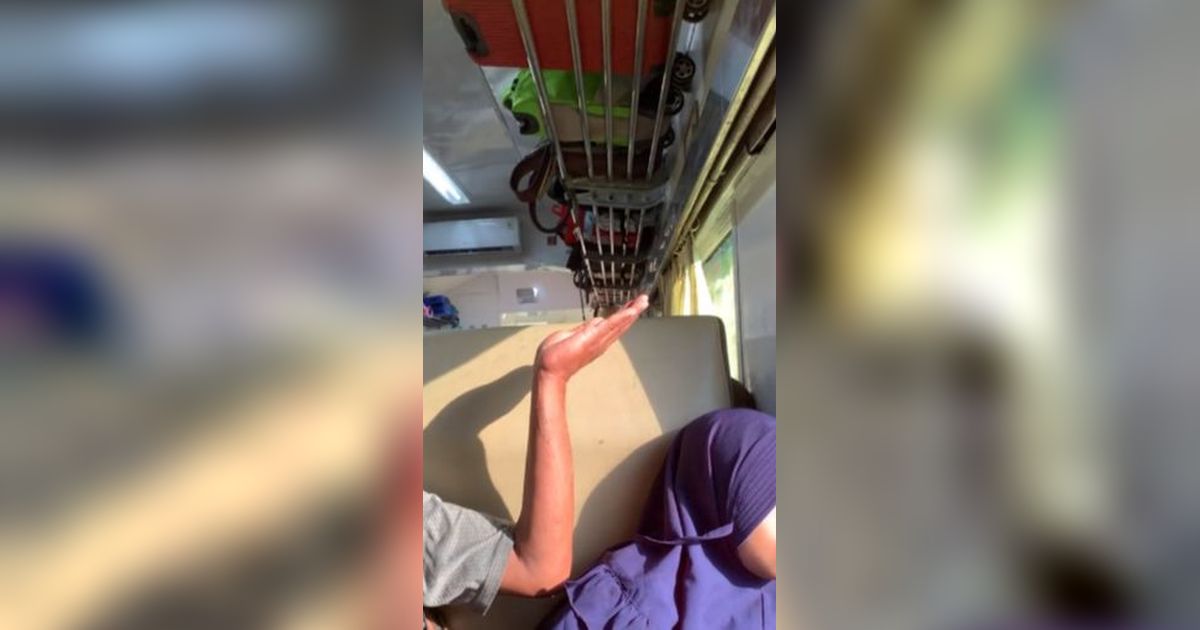 Momen Manis Ayah 'Lindungi' Anaknya dari Tetesan Air Bocor di Dalam Gerbong Kereta Api, Enggak Mau Ditawari Tisu