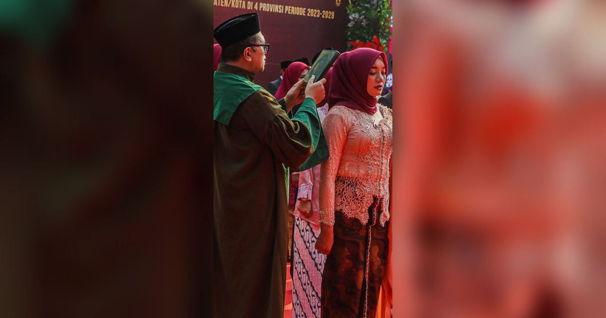 FOTO: Melihat Momen Pelantikan Anggota KPU untuk Provinsi, Kabupaten dan Kota Ambil Sumpah Jabatan di Jakarta