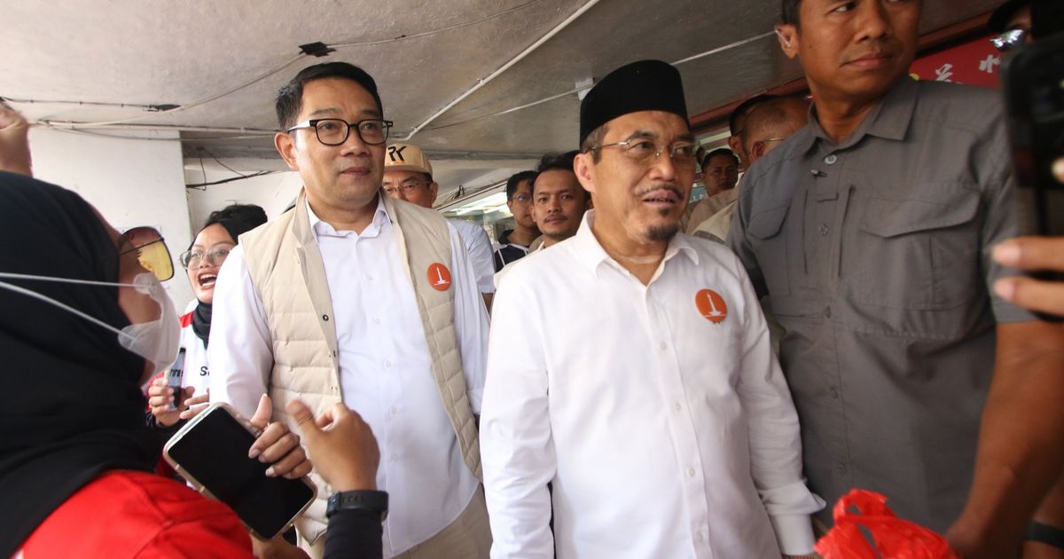 FOTO: Gaya Ridwan Kamil-Suswono Blusukan ke Glodok