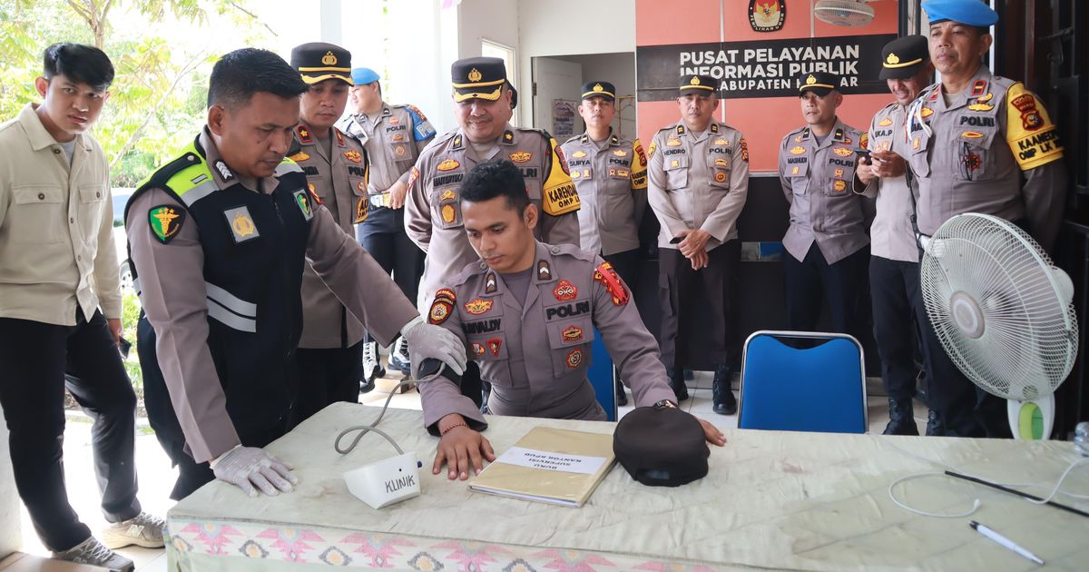 Para Personel Polri yang Tugas di Kantor KPU dan Bawaslu Kampar Dicek Kesehatan