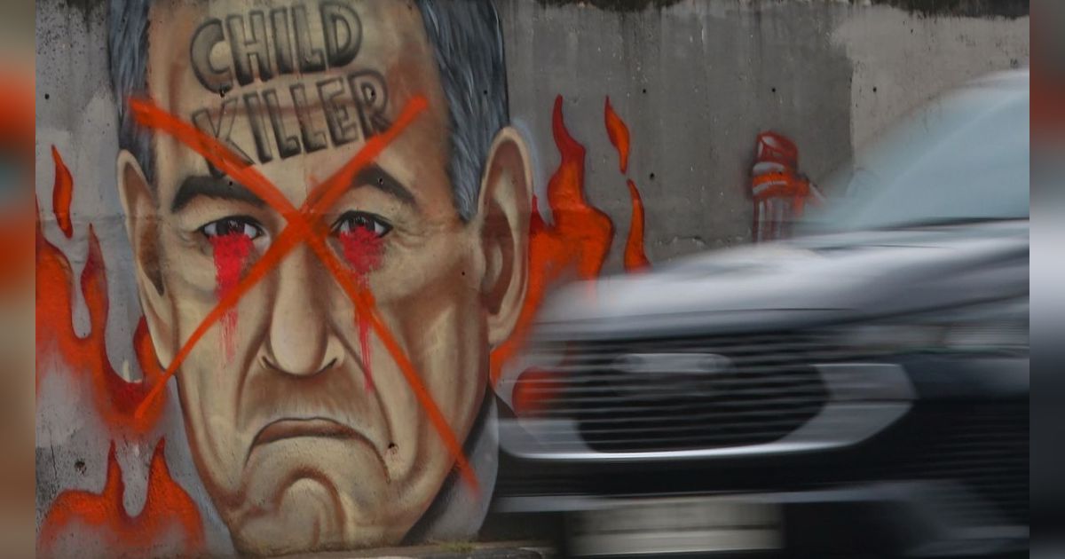 FOTO: Mural 'Stop Genocide' di Rafah Palestina dengan Wajah Benjamin Netanyahu Menghiasi Sudut Kota Jakarta