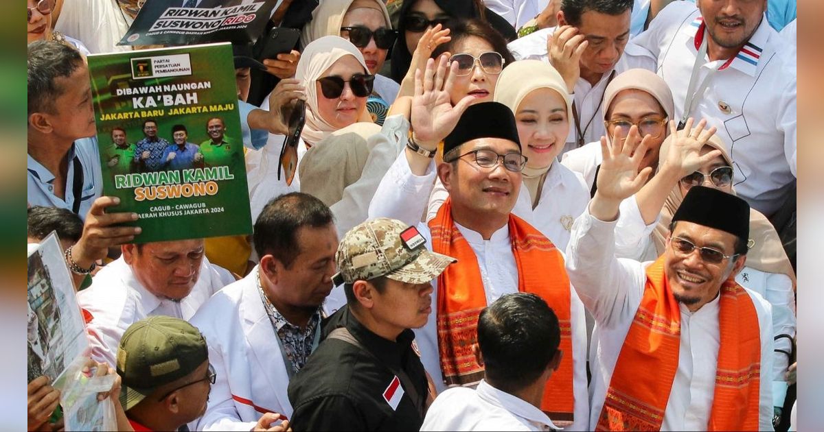 FOTO: Kompak Berbaju Koko ala Betawi, Ridwan Kamil-Suswono Jalan Kaki Diiringi Ondel-Ondel Daftar Pilkada Jakarta ke KPU