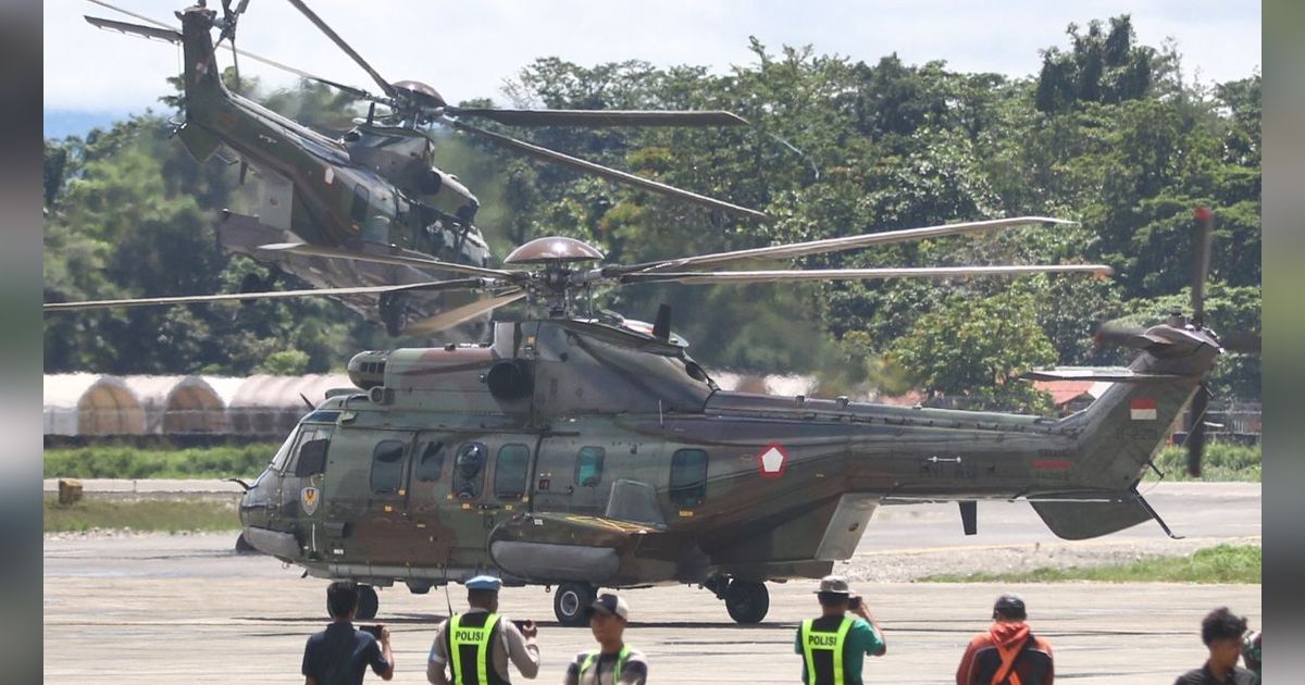 FOTO: Penampakan Helikoper TNI Dikerahkan untuk Evakuasi Jenazah Pilot Selandia Baru yang Dibunuh KKB di Papua