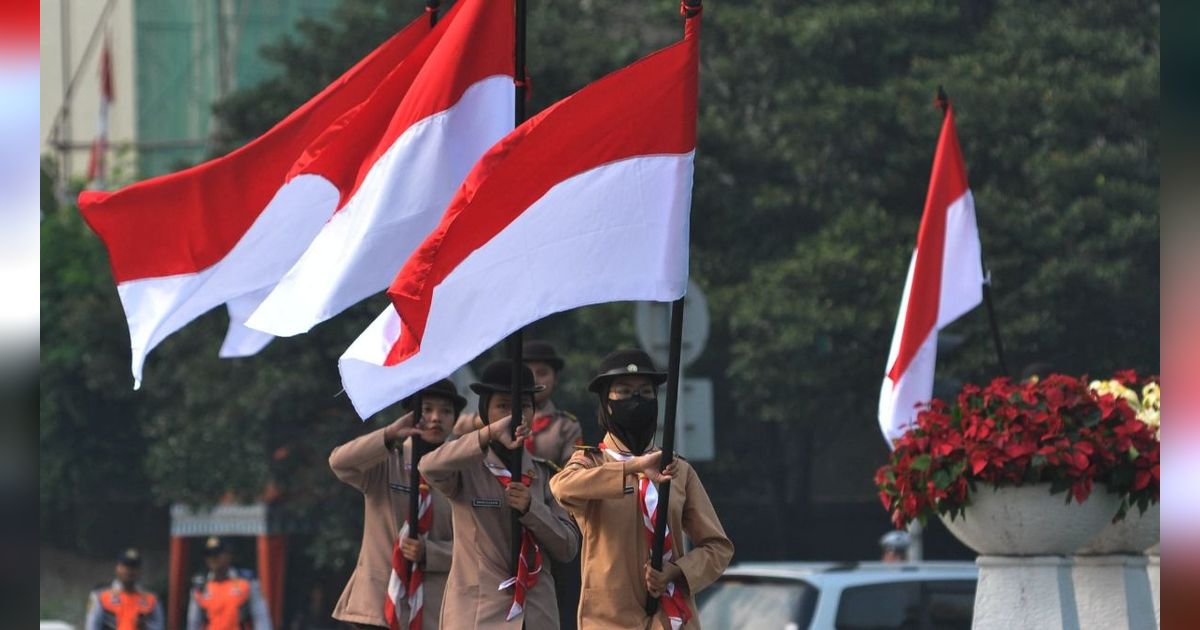 FOTO: Bulan Kebangsaan, Upacara Pengibaran Bendera Merah Putih Menghiasi Bundaran HI