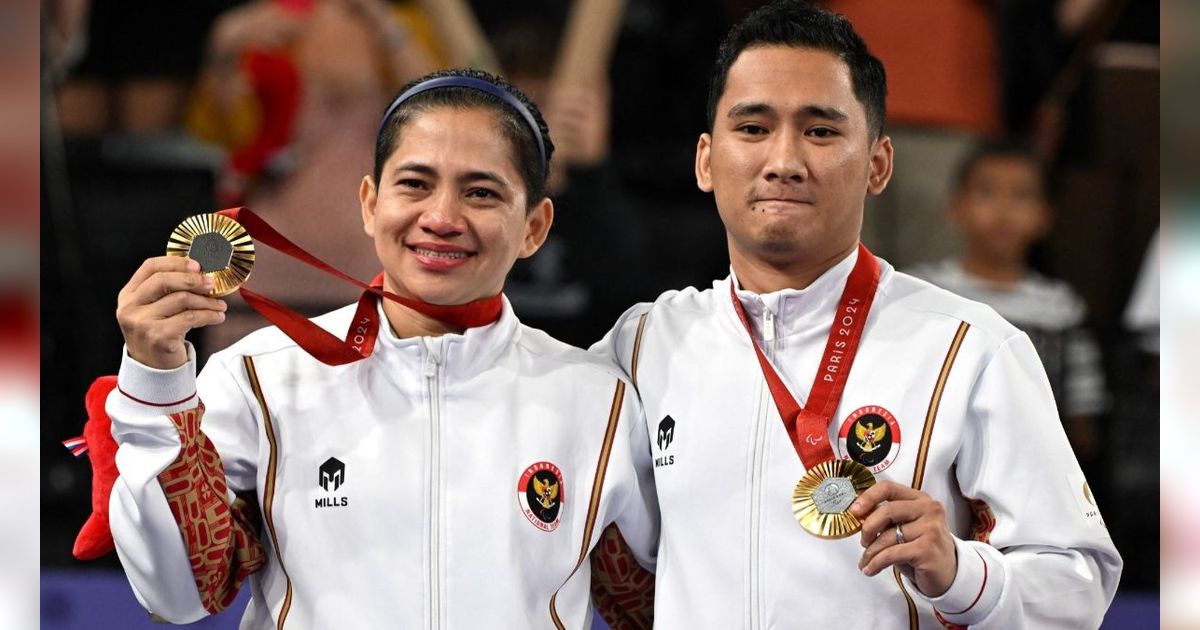 FOTO: Ganda Campuran Hikmat Ramdani dan Leani Ratri Oktila Raih Emas Pertama untuk Indonesia di Paralimpiade Paris 2024