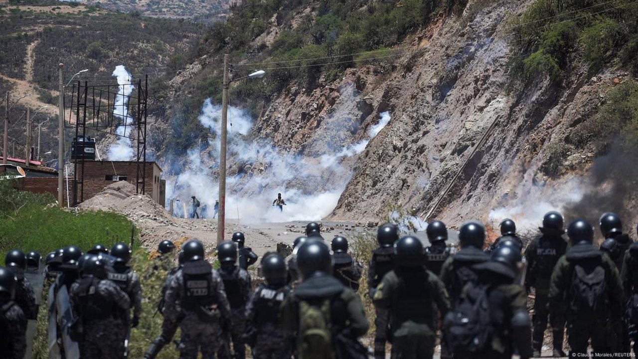 The Bolivian government has accused supporters of former President Evo Morales of holding soldiers hostage after protesters began blocking roads to prevent his arrest.