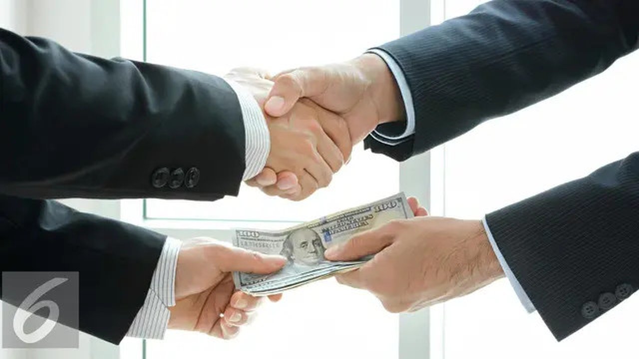 Ilustrasi penyuapan (iStockphoto)