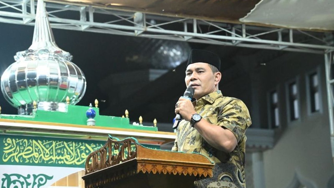 Bupati Aceh Besar, Muharram Idris, menekankan peran orang tua sebagai guru pertama dalam menanamkan kecintaan dan pembelajaran Al-Quran kepada anak sejak dini untuk mencetak generasi Qurani yang kuat.