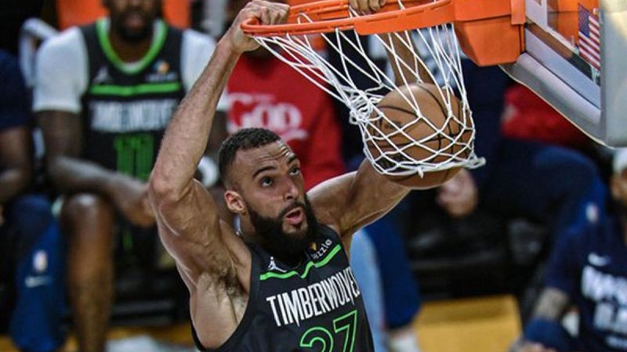 Rudy Gobert memimpin Minnesota Timberwolves menyingkirkan Los Angeles Lakers dengan skor 103-96 di game ke-5 playoff NBA, mencetak 27 poin dan 24 rebound.