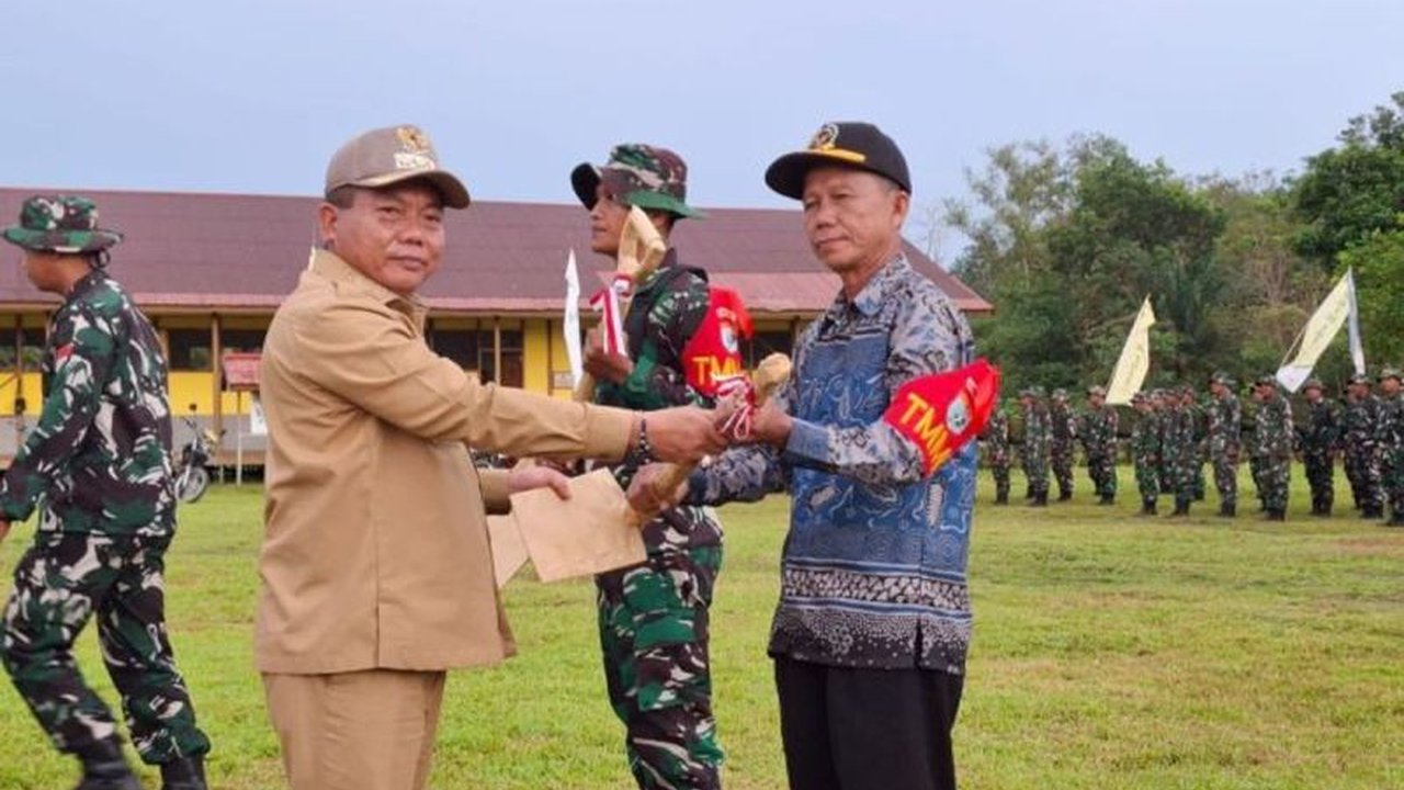 Pemerintah Kabupaten Kapuas, Kalimantan Tengah, memberikan dukungan penuh terhadap program TMMD ke-124 di Desa Lamunti Permai, bertujuan meningkatkan kesejahteraan masyarakat melalui pembangunan fisik dan non-fisik.