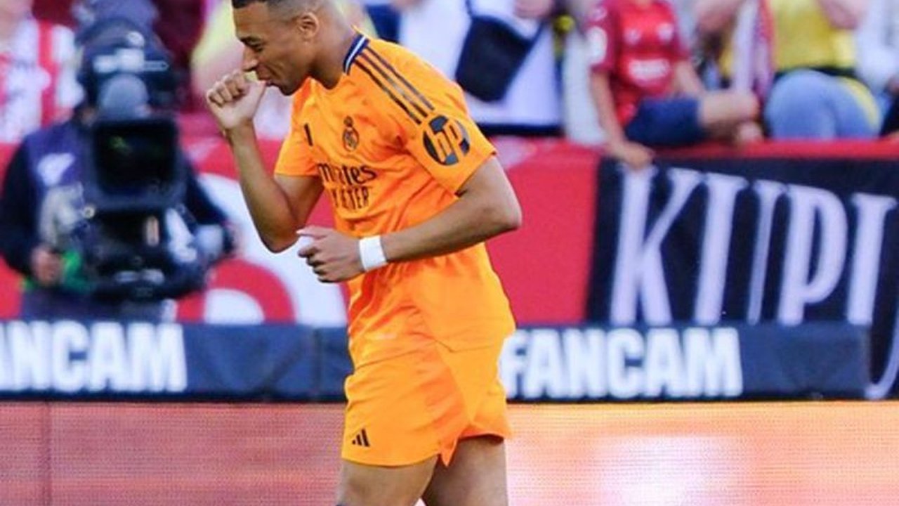 Real Madrid memastikan kemenangan 2-0 atas Sevilla dalam pertandingan Liga Spanyol yang menegangkan, di mana Sevilla bermain dengan sembilan pemain setelah dua kartu merah.