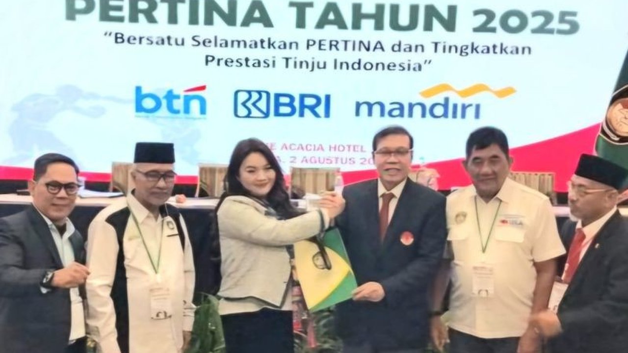 Hillary Brigitta Lasut resmi terpilih sebagai Ketum Pertina 2025-2029, mencetak sejarah sebagai perempuan pertama di dunia. Apa visinya untuk tinju Indonesia?