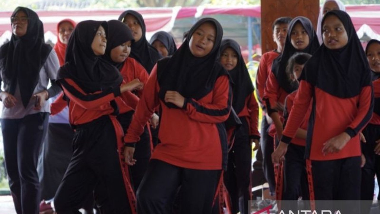 Puncak Hari Anak Nasional 2025 di Bantul tegaskan komitmen Pemkab dalam Perlindungan Anak Bantul, menuju generasi unggul dan berakhlak mulia.