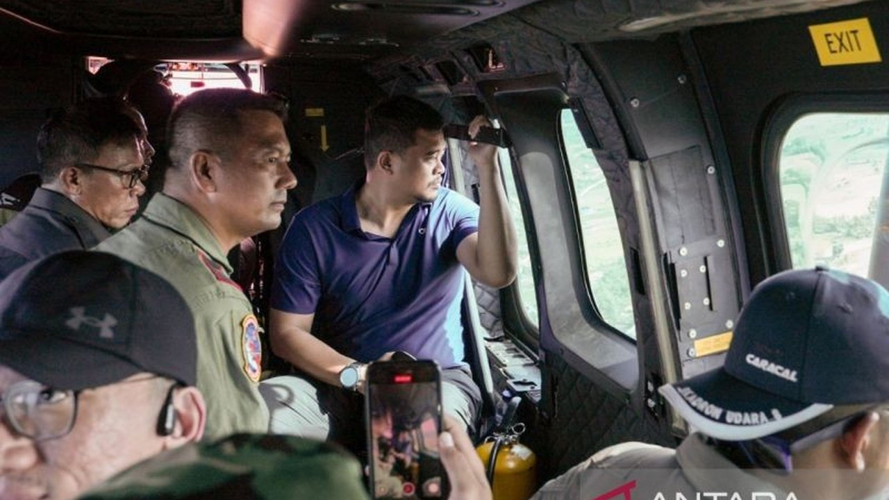Gubernur Sumut Bobby Nasution memastikan kelancaran Distribusi Bantuan Heli Tapanuli ke wilayah terisolasi akibat longsor, menjamin kebutuhan warga terdampak terpenuhi.