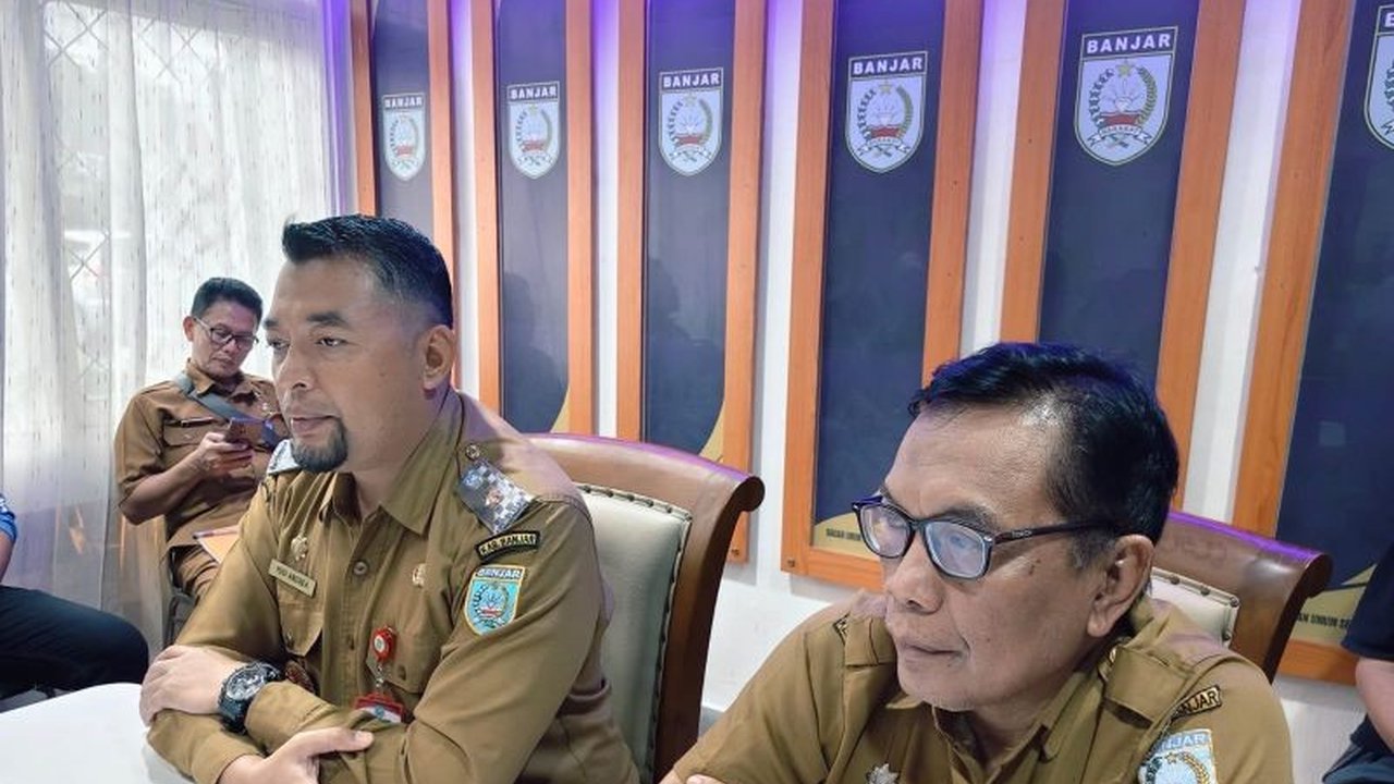 Pemkab Banjar mencatat lebih dari 122.000 warga terdampak Banjir Kabupaten Banjar yang meluas ke sembilan kecamatan, mengoptimalkan distribusi bantuan dan dapur umum.