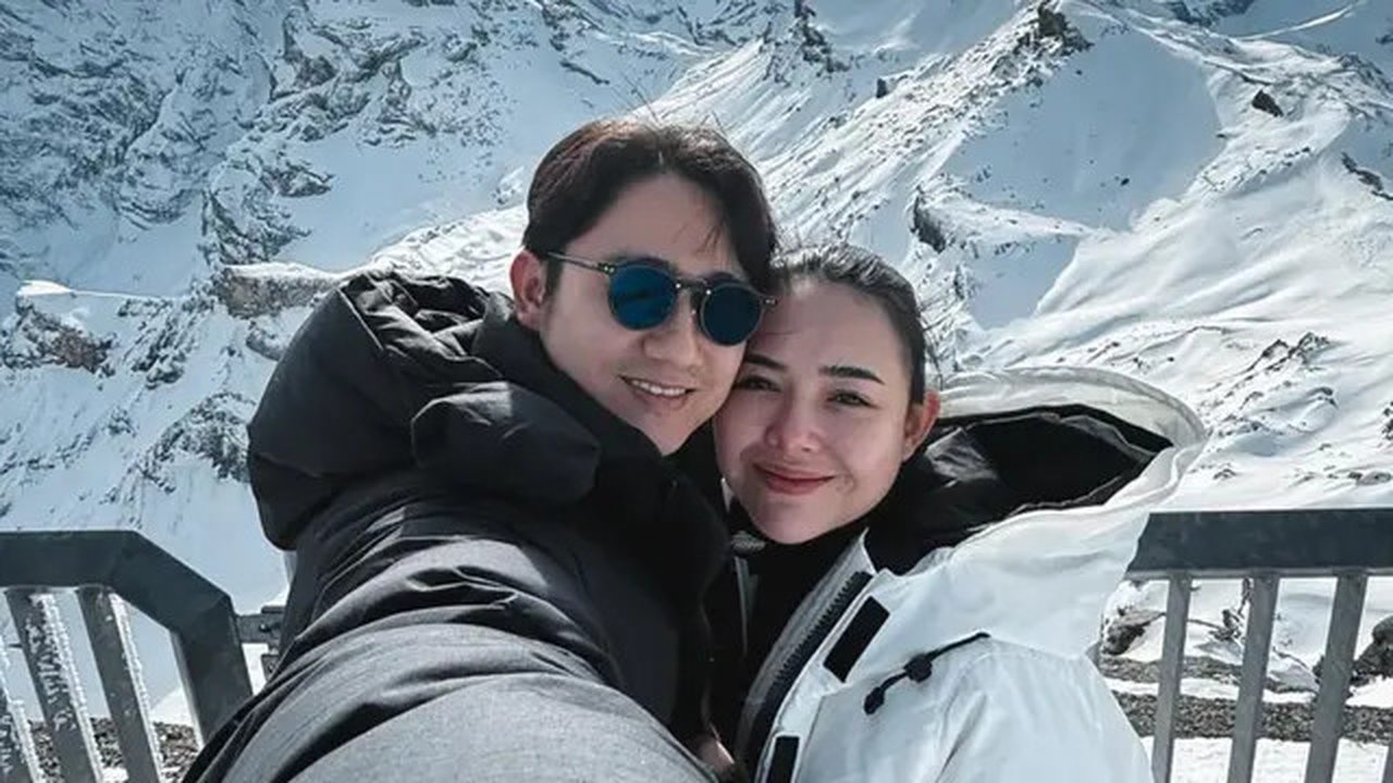 Kenny Austin dan Amanda Manopo Babymoon ke Tiga Negara Eropa dengan busana musim dingin. [@kennyauztin]
