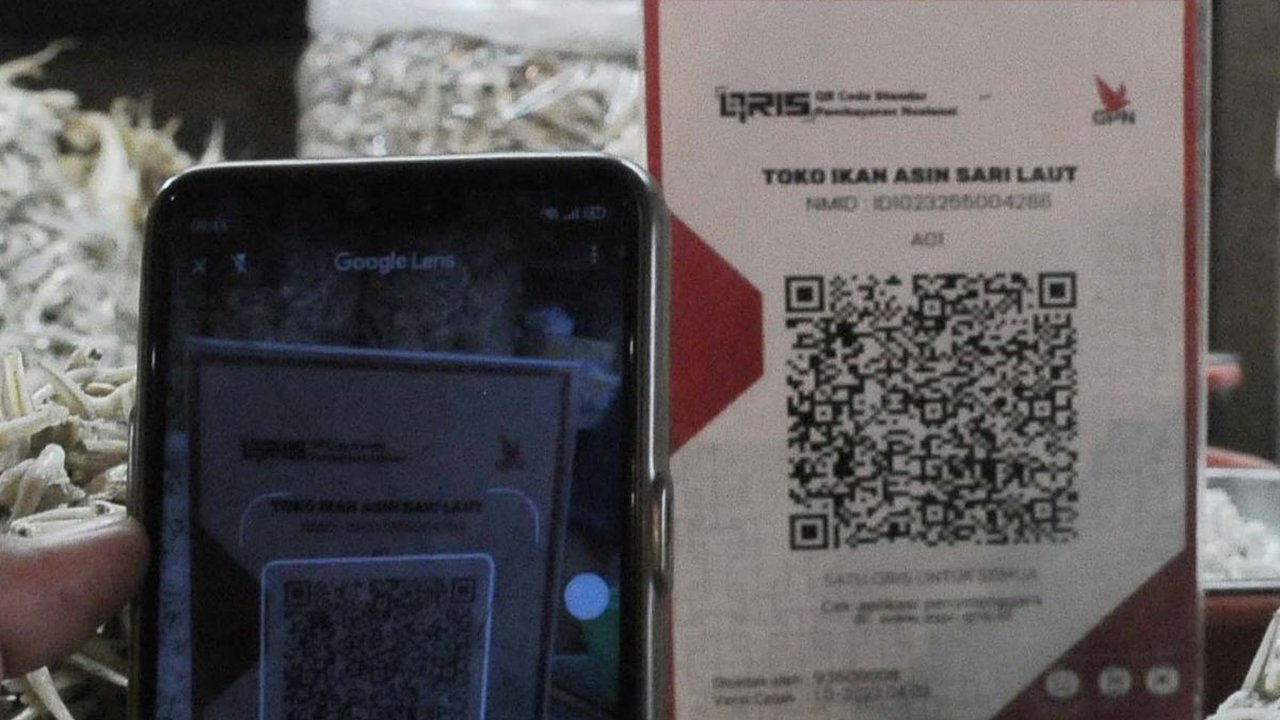 FOTO: Tak Lagi Gratis, Pelaku Usaha Mikro Kini Kena Tarif QRIS 0,3 Persen
