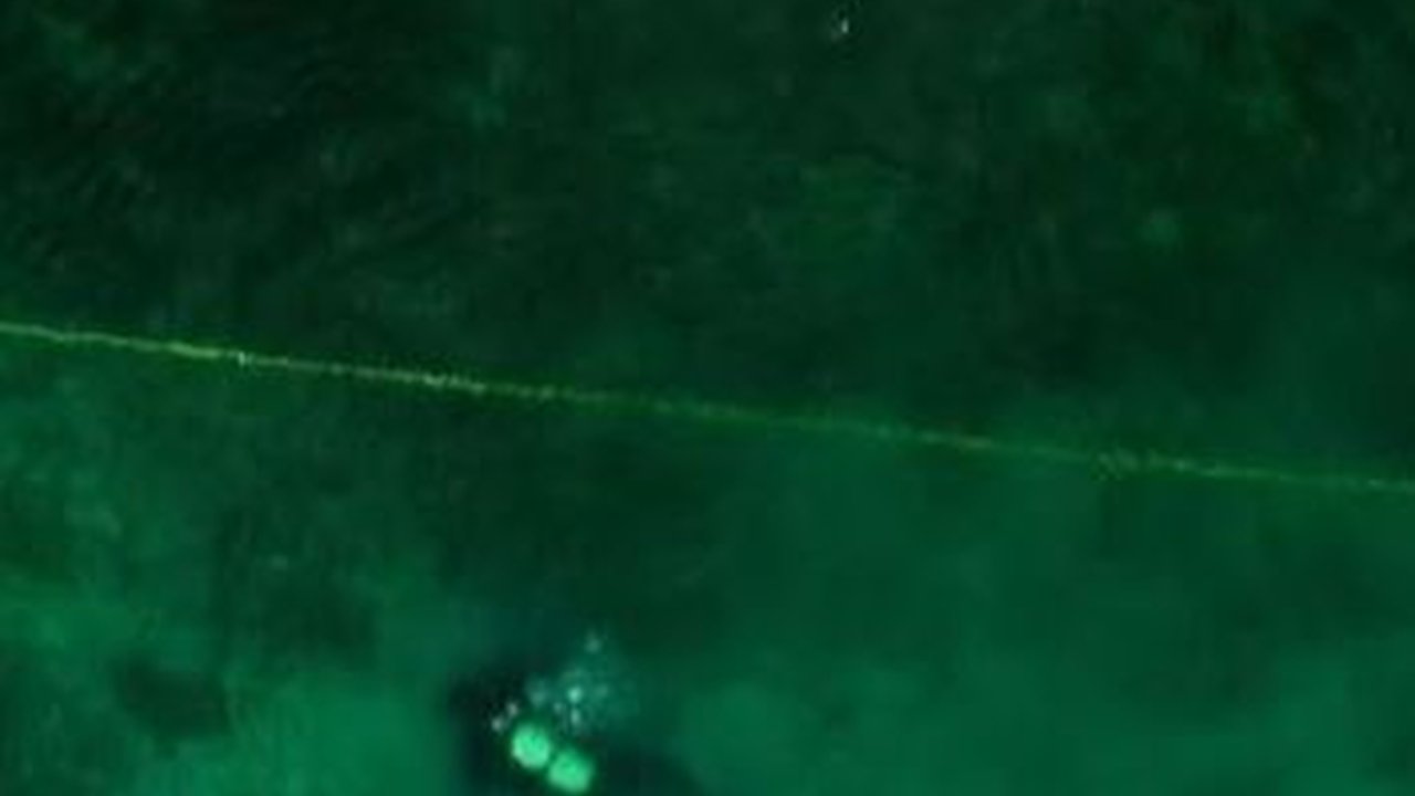 Desa Purba Berusia 8000 Tahun Ditemukan di Dasar Danau, Dikelilingi 100.000 Pagar Kayu Runcing