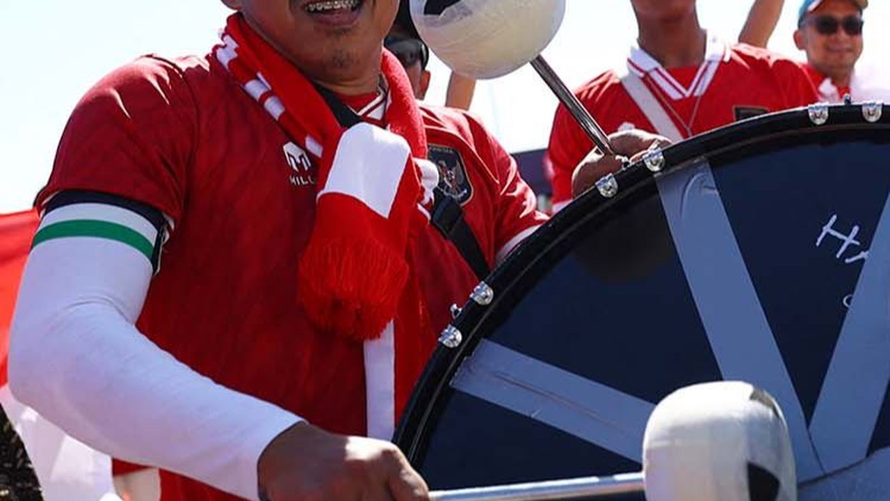 FOTO: Antusiasme Suporter Garuda Jelang Duel Timnas Indonesia vs Jepang di Piala Asia 2023
