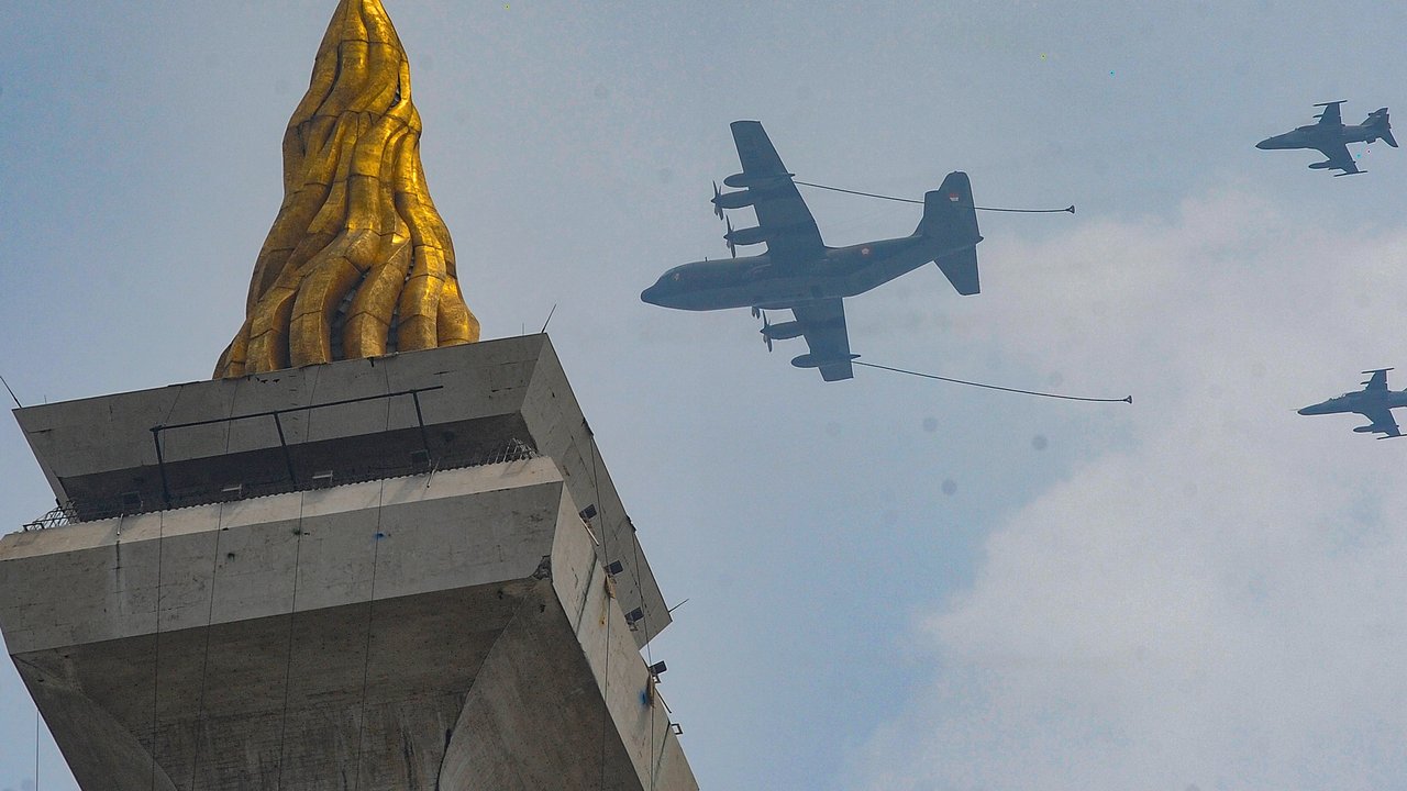 Presiden Joko Widodo atau Jokowi memimpin peringatan HUT ke-79 TNI di Monas, Jakarta, Sabtu (5/10/2024).