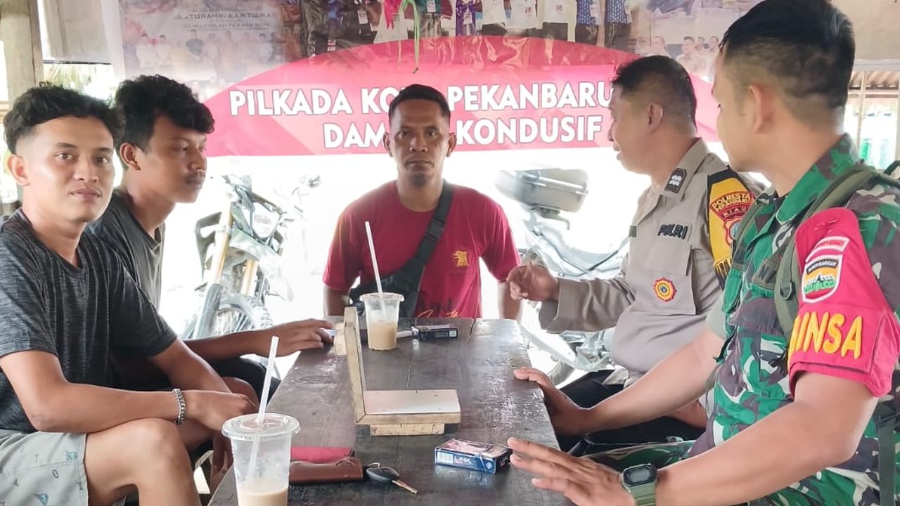 Duet Bhabinkamtibmas dan Babinsa di Pekanbaru