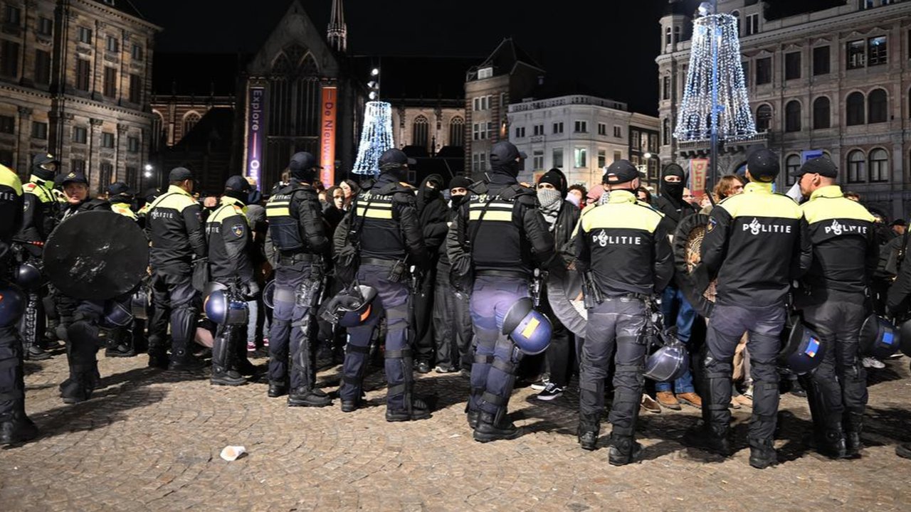 Dutch police have been accused of brutality following a banned pro-Palestinian protest in Amsterdam. Police said an incident involving members of the Mobile Unit was being investigated.