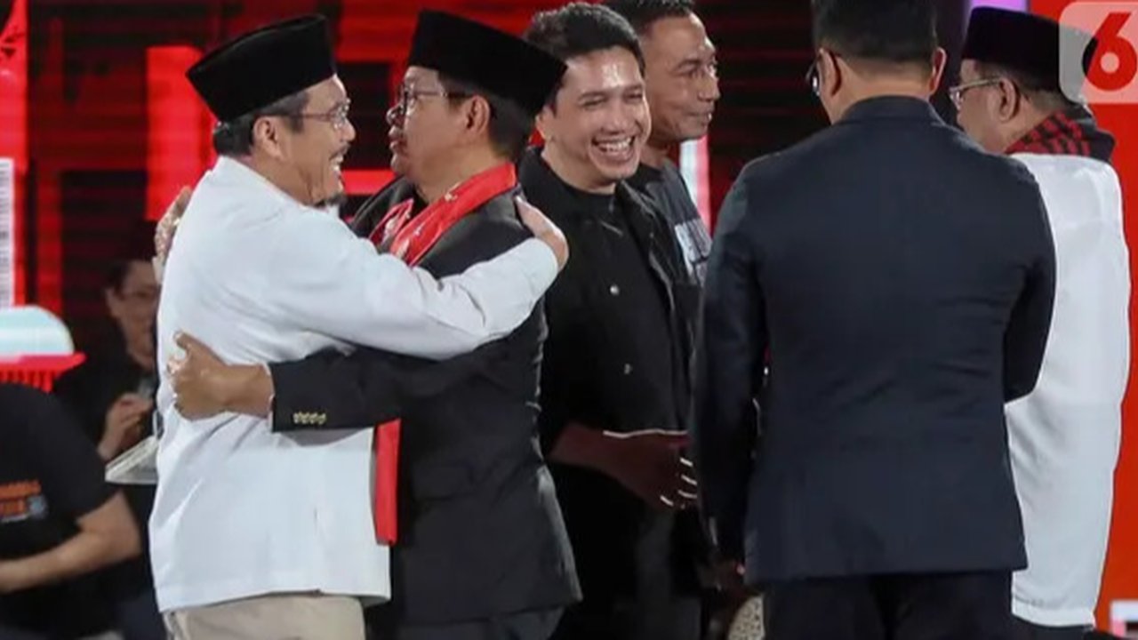 Pasangan Calon Pemilihan Kepala Daerah Jakarta atau Paslon Pilkada Jakarta 2024 nomor urut 3 Pramono Anung-Rano Karno dalam debat perdana Pilkada Jakarta 2024, Minggu (6/10/2024) di JIExpo Kemayoran, Jakarta Pusat. (YouTube KPU Provinsi Jakarta)