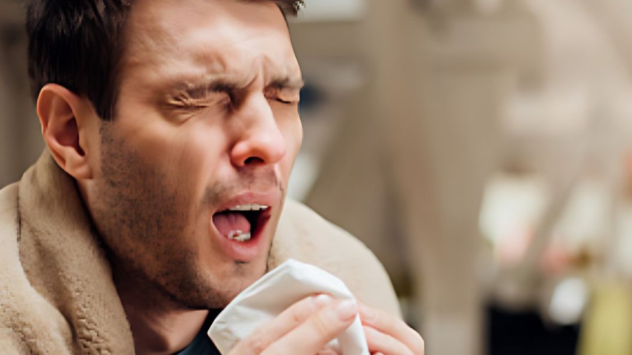 Ilustrasi orang sedang bersin.