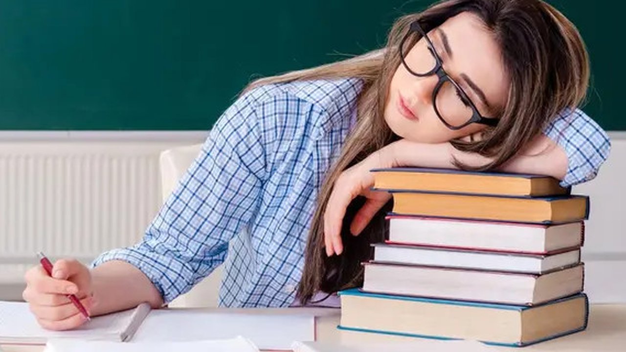 Ilustrasi pelajar sedang di perpustakaan.  (Champja/depositphotos)