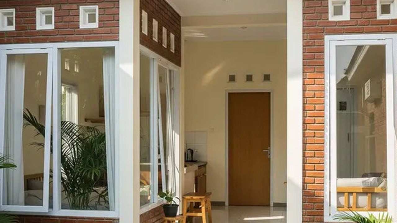 Desain Rumah Hook di Lahan Sempit. (Foto: Gemini AI)